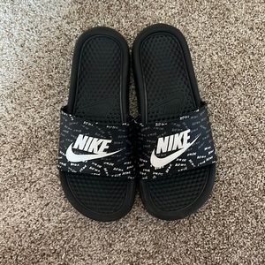 Black Nike slides
